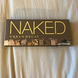 The original Naked palette!! Lighted used but still richly pigmented.